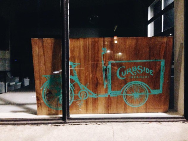 A Icicle Tricycles Cedar Wood Ice Cream Bike / Trike sign for Curbside Creamery